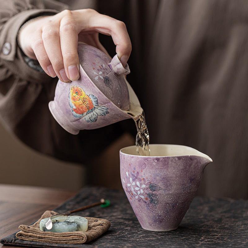 Ladies cover bowl purple tea cup ceramic is not hot, household high-end tea set under glaze hand-painted national style goldfish gift